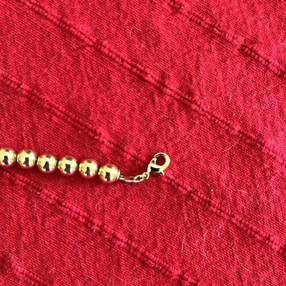 Gold tone Graduated Ball necklace. 16” - 18” long. In very good condition. - Picture 4 of 4